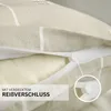 Close-up of a pillowcase showing a zipper detail and fabric texture. Produktbild-Vorschau