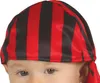 Close-up of a baby wearing a pirate-themed bandana. Anteprima dell’immagine prodotto