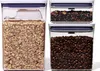 Three clear storage containers filled with oats, tea, and coffee beans, arranged on a white background. Náhľad obrázku produktu