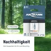 A product shot of a 9V ANSMANN rechargeable battery pack, set against a blurred forest background. The packaging highlights sustainability features. Produktbild-Vorschau