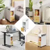 Collage of a narrow rolling side table with a drawer and shelf, shown in different room settings. Voir les images du produit