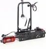 A black bicycle rack with red lights, shown against a white background. Voir les images du produit