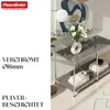 A lowboard or sideboard with decorative items on it, set against a plain background with some abstract art on the wall. Anteprima dell’immagine prodotto
