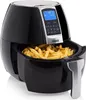 A black air fryer filled with french fries, shown from a slightly elevated side angle. Produktbild-Vorschau