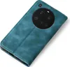 A teal flip case for a smartphone, showing the camera module on the back. Produktbild-Vorschau