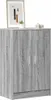 A gray wooden shoe cabinet with two doors and two handles, placed on a white background. A framed picture and two decorative items are on top of the cabinet. Podgląd zdjęcia produktu