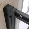 A close-up view of the corner of a black metal shower enclosure frame, showing the connection points and a sliding track. Produktbild-Vorschau