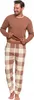 A man wearing pajamas stands against a white background. Produktbild-Vorschau