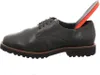 A black leather shoe with an orange and gray insole partially inserted. Anteprima dell’immagine prodotto