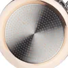 Close-up view of the bottom of a copper frying pan, showing its textured surface. Anteprima dell’immagine prodotto