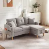 A light gray sectional sofa with a chaise lounge is shown in a well-lit living room setting. Náhľad obrázku produktu