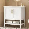 A white bathroom vanity with a gold faucet and a marble countertop, featuring two doors and an open shelf below, styled with folded towels. Voir les images du produit
