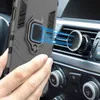 A hand holding a phone case with a ring stand, attaching it to a magnetic car mount on an air vent. Produktbild-Vorschau