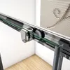 Close-up view of a shower enclosure's sliding mechanism, showing the roller and track. Produktbild-Vorschau