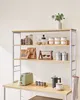 A kitchen shelf unit with various items on its shelves and countertop. Náhled obrázku produktu
