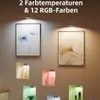 Kleine graue Puck-Leuchten, die verschiedene Wandkunst und Nischen mit unterschiedlichen Farbtemperaturen und RGB-Farben beleuchten Náhled obrázku produktu