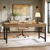 A home office setup with a wooden desk, chair, and decorative items. Voir les images du produit