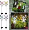 Collage of solar-powered angel garden lights in various colors, shown both individually and in a garden setting. Náhľad obrázku produktu