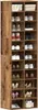 A tall, narrow shoe cabinet with multiple shelves filled with shoes and some boxes. Anteprima dell’immagine prodotto