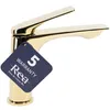 A gold-colored faucet with a warranty tag attached. Produktbild-Vorschau