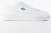 A white Lacoste sneaker is shown from the side against a white background. Náhľad obrázku produktu