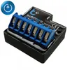 A close-up, slightly angled view of a black electronic device with a blue terminal block. Produktbild-Vorschau