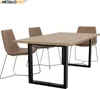 A dining table with three chairs against a white background. Produktbild-Vorschau