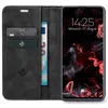 A black flip-style phone case with card slots and a phone inside showing the lock screen. Produktbild-Vorschau