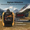 A portable generator is shown in a natural outdoor setting with mountains in the background. A digital display shows generator status. Produktbild-Vorschau