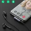 A smartphone is shown with a video call interface, connected to a Ugreen USB-C to 3.5mm audio adapter and earphones. Podgląd zdjęcia produktu