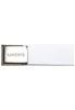 A white textile belt with a silver buckle featuring the Lacoste logo. Produktbild-Vorschau