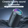 A portable Bluetooth speaker with colorful LED lights is displayed on a textured, dark gray surface, with a starry night sky in the background. Produktbild-Vorschau