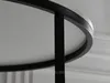 A close-up view of a round table with a white surface and black metal frame. Náhľad obrázku produktu