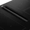 A close-up, angled view of a black induction hob with an integrated downdraft extractor. The Beko logo is visible. Náhled obrázku produktu