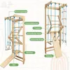 A diagram of a wooden climbing frame with various accessories, labeled with German text. Produktbild-Vorschau