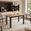 A dining table set in a modern kitchen or dining area. Produktbild-Vorschau