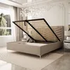 A bedroom with a bed frame that has its storage compartment open. Produktbild-Vorschau