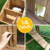 A collage of four images showing details of a wooden rabbit hutch, including a rabbit inside, a doorway, a latch, and a ramp. Produktbild-Vorschau