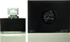 A black perfume bottle and its packaging are displayed side-by-side against a white background. Náhľad obrázku produktu