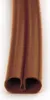 A close-up view of a brown plastic profile rail. Produktbild-Vorschau