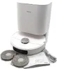 A white robotic vacuum cleaner with its charging dock and accessories, including two mop heads and a manual, is displayed against a white background. Voir les images du produit