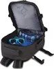 An open backpack with items inside. Podgląd zdjęcia produktu