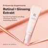 A tube of eye cream is presented on a flowing pink fabric background. Voir les images du produit
