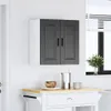 A wall-mounted kitchen cabinet with two dark gray doors is shown above a small white kitchen cart with a wooden top. Podgląd zdjęcia produktu