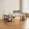 A modern L-shaped desk setup in a well-lit room with a window. Produktbild-Vorschau