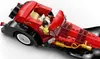 A close-up view of a red and black LEGO toy car with a minifigure inside. Voir les images du produit