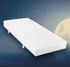 A white mattress is shown against a night sky with a large moon. Produktbild-Vorschau