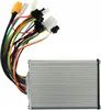 A close-up of an electronic controller with many wires. Produktbild-Vorschau