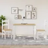 A dining set with two chairs and a table in a room with artwork on the wall. Produktbild-Vorschau