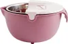 A pink and white multi-functional kitchen colander and bowl set with a stainless steel insert. Produktbild-Vorschau